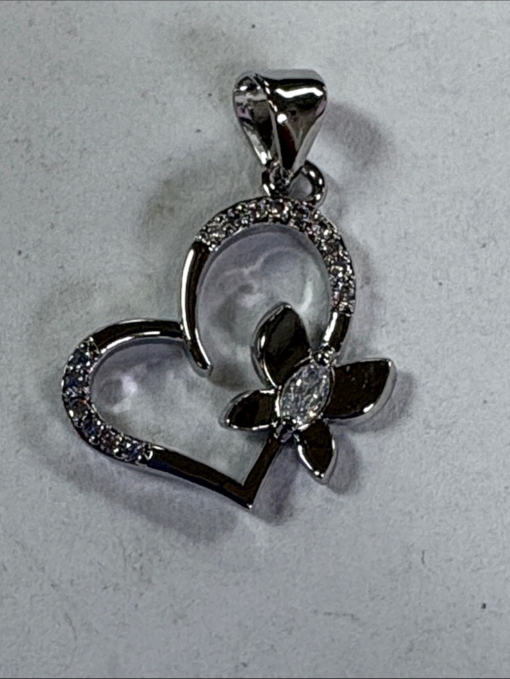 Silver Heart Pendant Necklace with Floral Crystal Accent - White